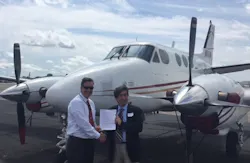 Aerosim Flight Academy President and General Manager Hank Coates and P.J. Nogueroles, president, Aeroclub Barcelona-Sabadell.