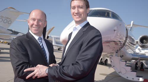 Jordan Hansell, Chairman and CEO, NetJets (right) and Alain Bellemare, President and CEO, Bombardier Inc. (left) at EBACE 2015.