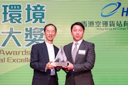 Hactl Executive Director Kenneth Chan (right) receives the trophy from Mr. Lam Chiu-ying, Chairman of the Environmental Campaign Committee. Hactl Executive Director Kenneth Chan (right) receives the trophy from Mr. Lam Chiu-ying, Chairman of the Environmental Campaign Committee.