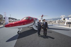 Graham Williamson, TAG Aviation Europe&apos;s President Aircraft Management and Charter Services (left) is pictured with Michimasa Fujino, Honda Aircraft Company&apos;s President and CEO, in front of a HondaJet demonstration aircraft at EBACE 2015 in Geneva, on Monday 18 May 2015.