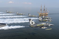 Breitling Jet Team flies over replica of 18th century ship Hermione in Chesapeake Bay, VA.