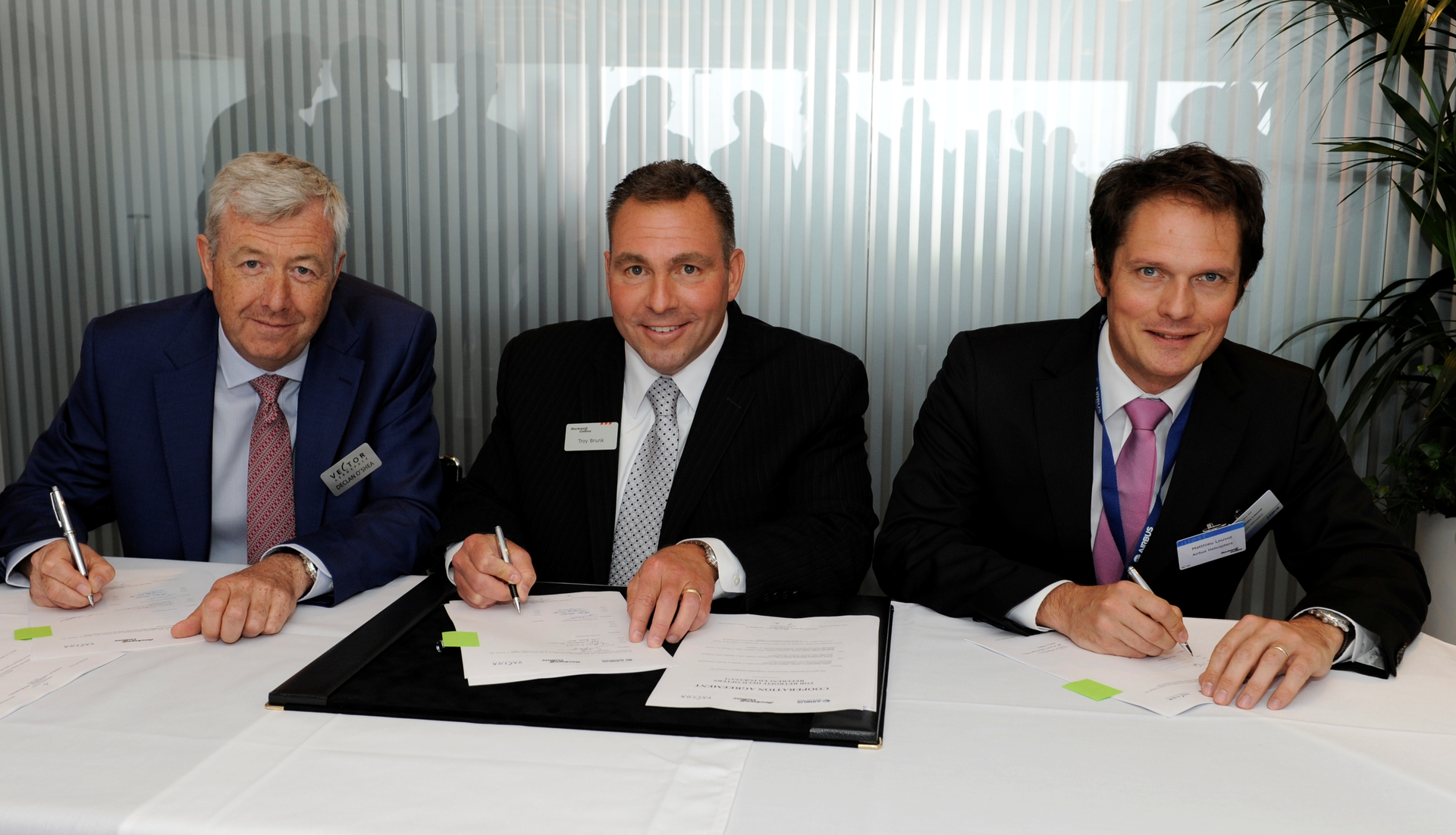 Pro Line Fusion cockpit upgrade agreement signing. Right: Matthieu Louvot, senior vice president, Customer Services, Airbus Helicopters, Center: Troy Brunk, vice president and general manager, Airborne Solutions, Rockwell Collins Left: Declan O'Shea, president and CEO, Vector Aerospace Corporation.