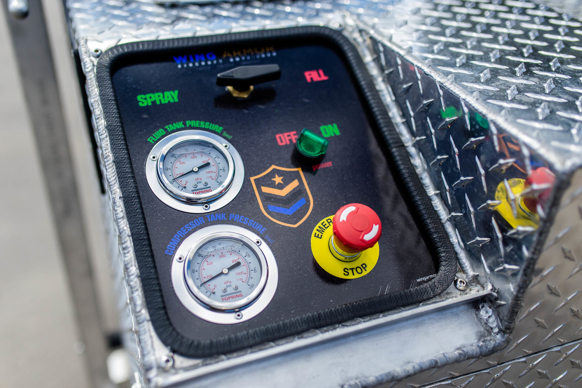 The Wing Armor anti-icing system's control panel is intuitive. There's an off/on button and emergency stop button and meters to track spray in the fluid tank and the compressor tank.