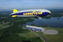 Goodyear's new 'Wingfoot One' airship flying over its home hanger at Wingfoot Lake, Ohio. Goodyear's new 'Wingfoot One' airship flying over its home hanger at Wingfoot Lake, Ohio.