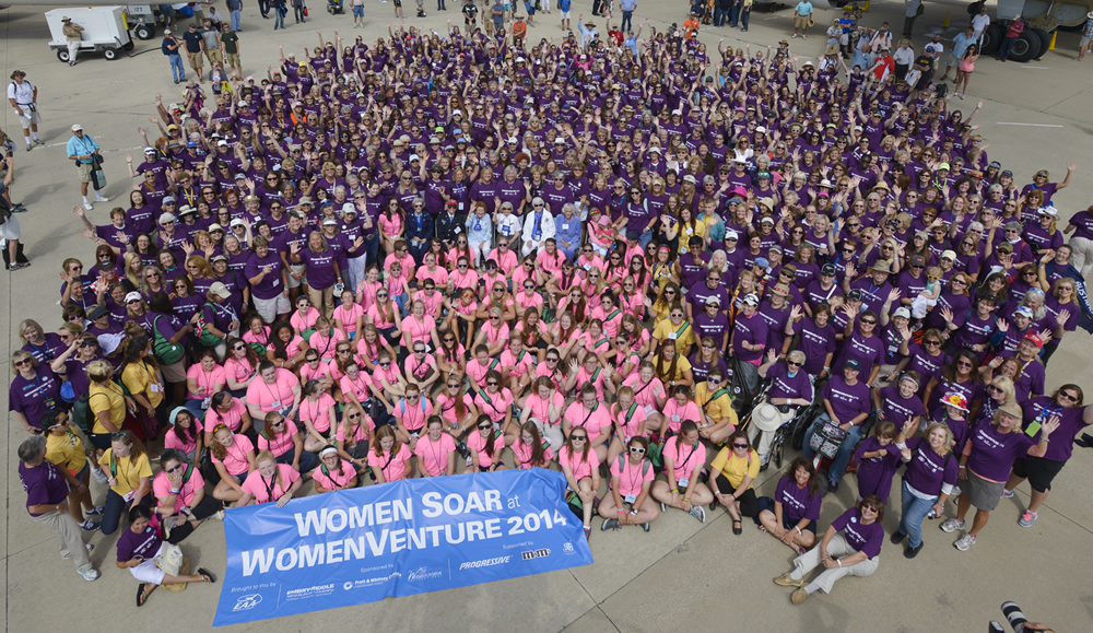 Group photo of women aviators on Boeing Plaza during EAA AirVenture Oshkosh 2014.