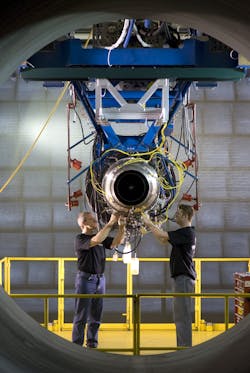 Vector Aerospace technicians work on a JT15D turbofan engine. Vector Aerospace technicians work on a JT15D turbofan engine.
