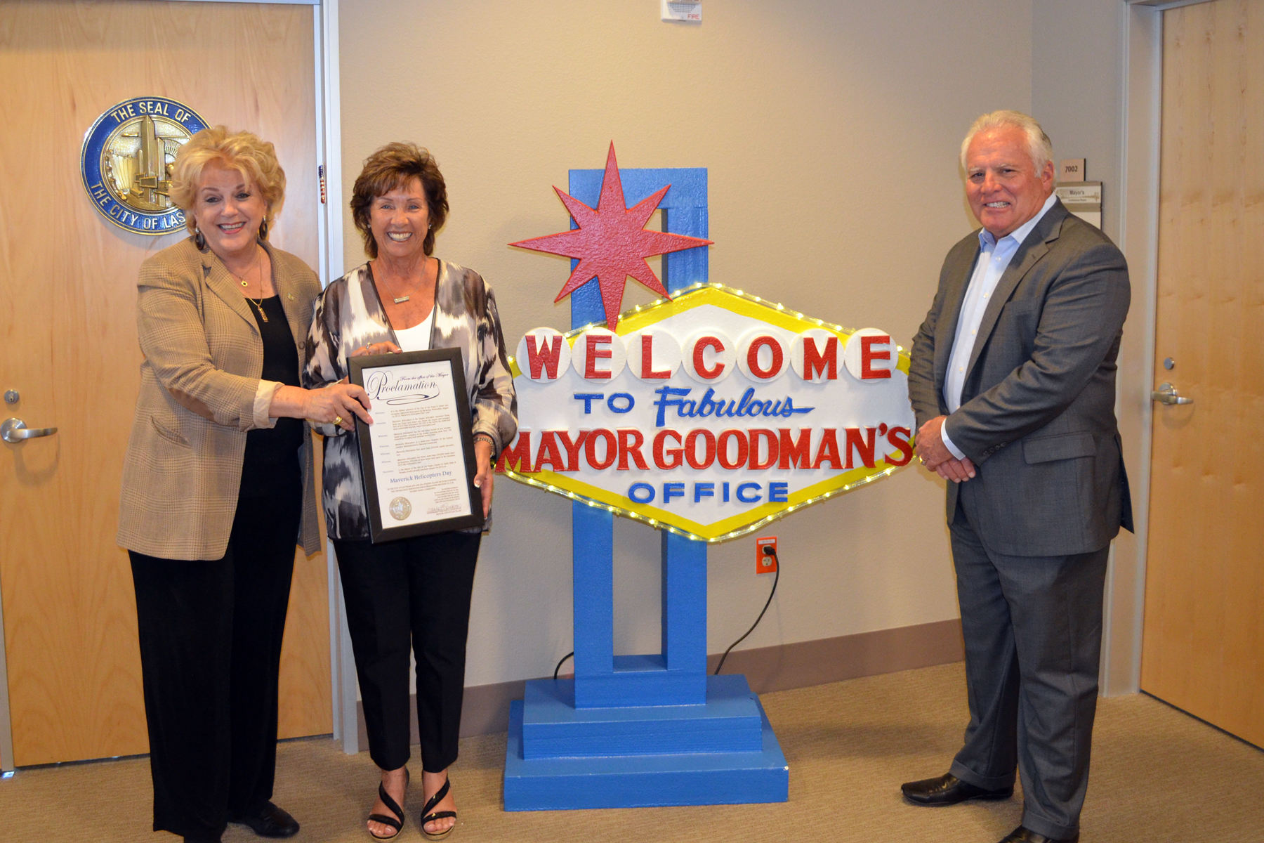 From left to right: Carolyn Goodman (Mayor of Las Vegas), Brenda Rochna and Greg Rochna (Founders of Maverick Helicopters).