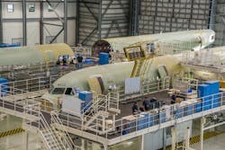 Major components of the first two aircraft to be assembled at the Airbus U.S. Manufacturing Facility are shown in the main final assembly hangar at this American A320 Family production site.