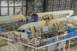 Major components of the first two aircraft to be assembled at the Airbus U.S. Manufacturing Facility are shown in the main final assembly hangar at this American A320 Family production site. Major components of the first two aircraft to be assembled at the Airbus U.S. Manufacturing Facility are shown in the main final assembly hangar at this American A320 Family production site.