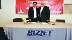 From left: Zhao Wei, President of Jing Cheng Group, and Brian Barber, BizJet Vice President of Sales and Marketing.