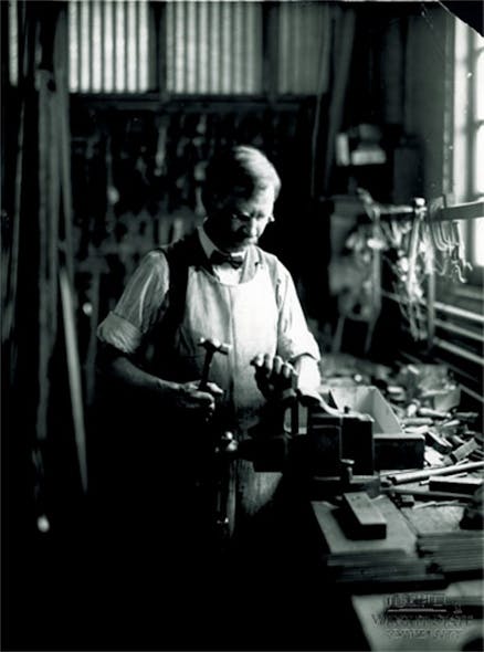 1911: Charles Taylor in the Wright workshop How many people work in their shop today in a bow tie? What a professional.