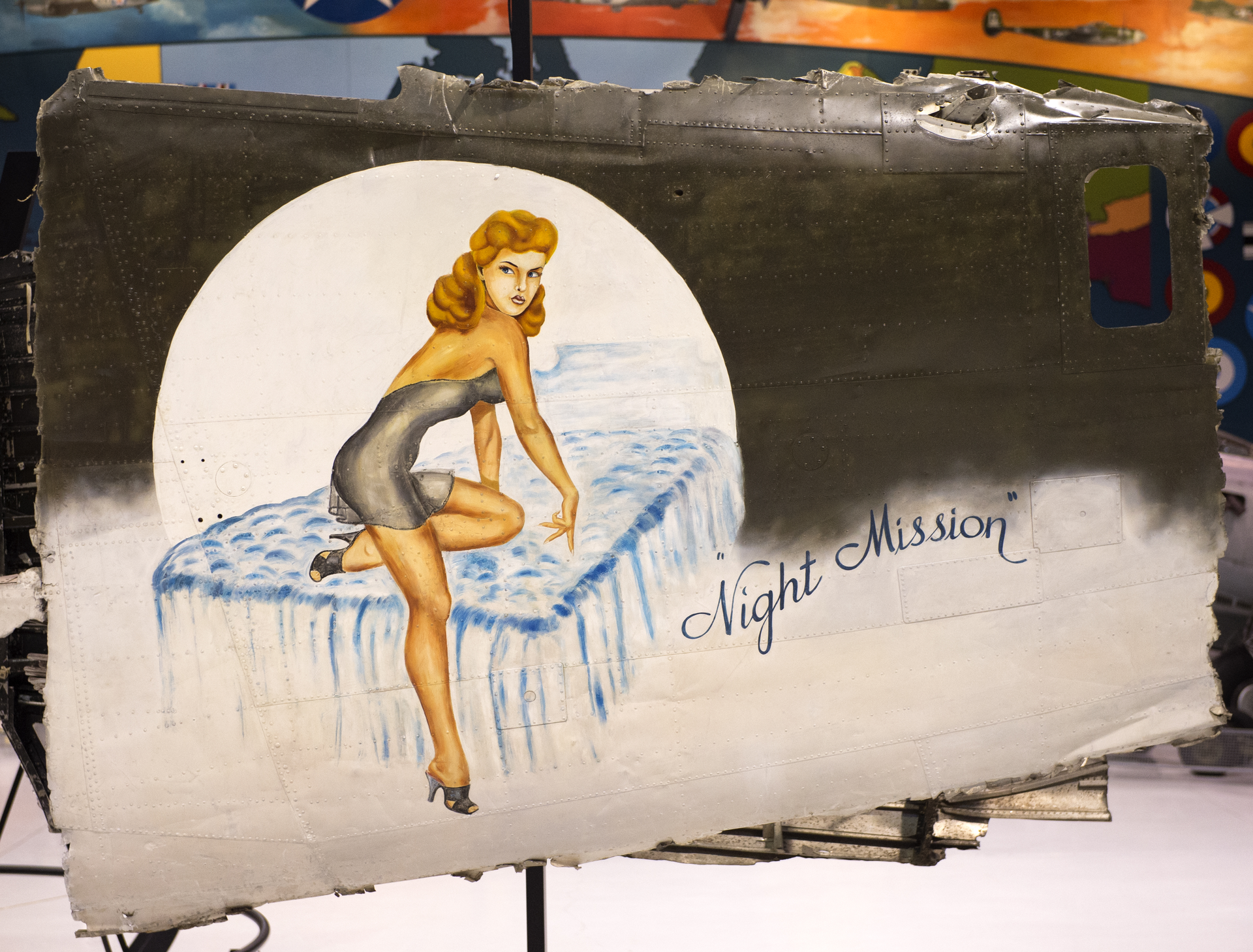 'Night Mission,' one of the more than 30 pieces of WWII nose art from the Commemorative Air Force now on display at the EAA AirVenture Museum in Oshkosh.