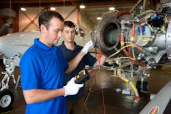 Vector technicians work on aircraft engine Vector technicians work on aircraft engine