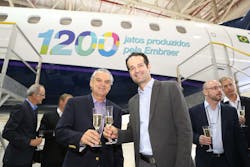 (L-R) Paulo Cesar Silva, President & CEO, Embraer Commercial Aviation and Antonoaldo Neves, President of Azul celebrating the 1,200th E-Jet delivery. (L-R) Paulo Cesar Silva, President & CEO, Embraer Commercial Aviation and Antonoaldo Neves, President of Azul celebrating the 1,200th E-Jet delivery.