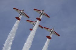 The AeroShell Aerobatic Team is one of the top civilian formation teams in the world, shown here flying at EAA AirVenture Oshkosh 2015.