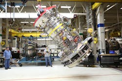 The first full GE9X engine is rotated into the horizontal assembly position at GE Aviation&rsquo;s Evendale, Ohio development assembly area.