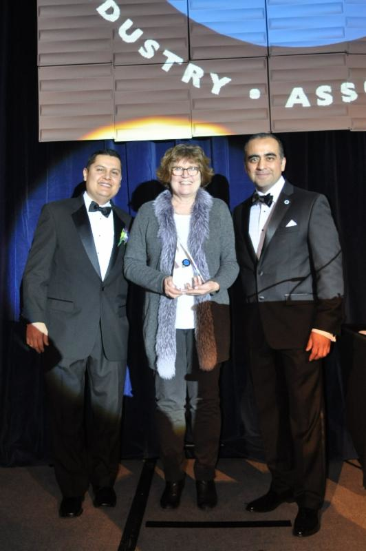 From left to right, Ivan Solis, HACIA president, Ginger S. Evans, CDA commissioner and Jorge Perez, HACIA executive director.