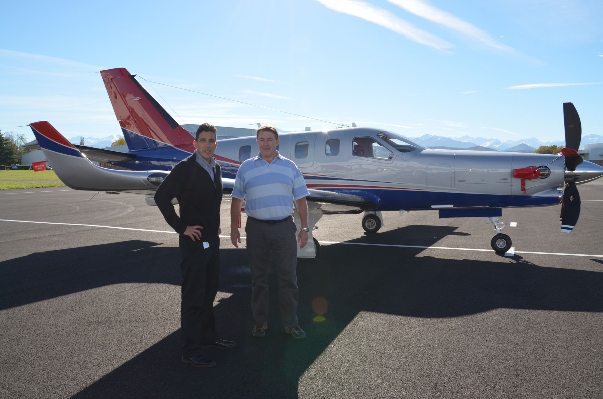Mark Diaz, the Daher Airplane Business Unit&rsquo;s director of sales for Europe & AsiaPacific Area (at left) joins John Giddens, owner of the TBM 900 on display at this year&rsquo;s Singapore Airshow