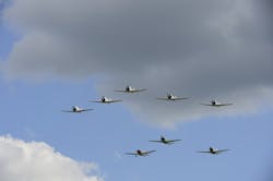 Vintage military aircraft in Japanese WWII markings fly during the performance of the Tora Tora Tora re-enactment of the Pearl Harbor attack. Flown during EAA AirVenture 2013. Vintage military aircraft in Japanese WWII markings fly during the performance of the Tora Tora Tora re-enactment of the Pearl Harbor attack. Flown during EAA AirVenture 2013.