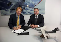 Jackson Schneider, president and CEO, Embraer Defense & Security, and Ulrich Sasse, president of Rheinmetall Simulation and Training, sign the contract at FIDAE. Jackson Schneider, president and CEO, Embraer Defense & Security, and Ulrich Sasse, president of Rheinmetall Simulation and Training, sign the contract at FIDAE.