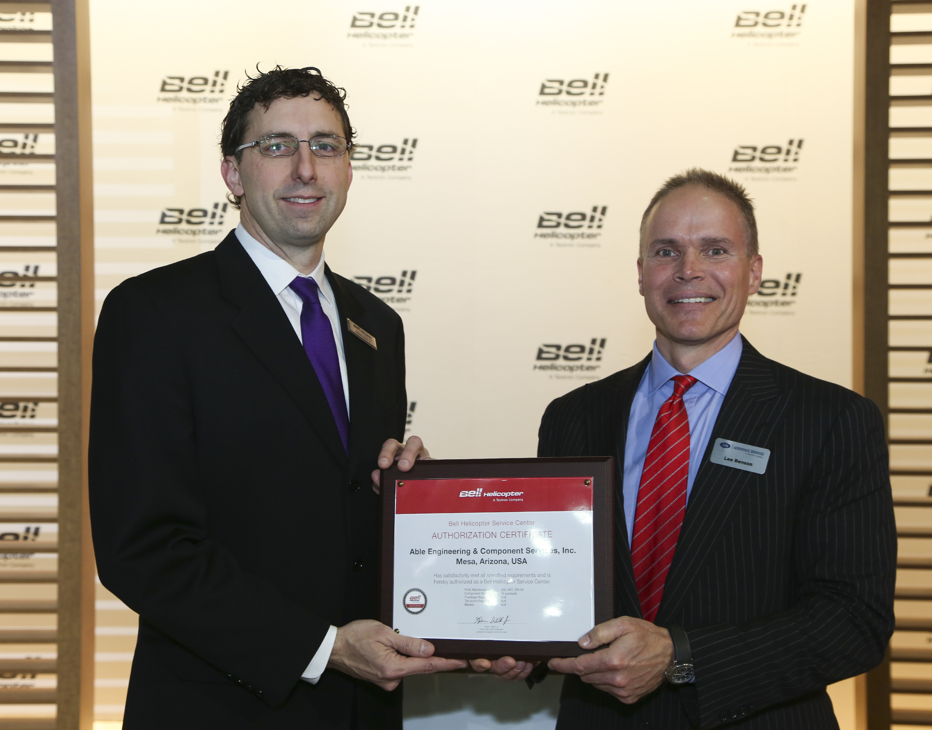 Bell Helicopter announces Able Aerospace Services as newest Service Center at HAI Heli-Expo 2016. From left to right: Glenn Isbell, executive vice president, Customer Support and Services at Bell Helicopter and Lee Benson, chief executive officer, Able Aerospace Services.