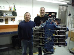 Dwain Harris (L) Harmon Rocket builder and Rob Horvath, Master Engine Builder with the 2,100th engine assembled by Aero Sport Power. Dwain Harris (L) Harmon Rocket builder and Rob Horvath, Master Engine Builder with the 2,100th engine assembled by Aero Sport Power.