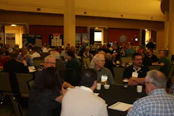 ATEC Conference attendees visit during a morning break between sessions. ATEC Conference attendees visit during a morning break between sessions.