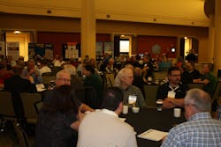 ATEC Conference attendees visit during a morning break between sessions.
