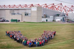 Vector employees in a V formation outside the Summerside facility. Vector employees in a V formation outside the Summerside facility.