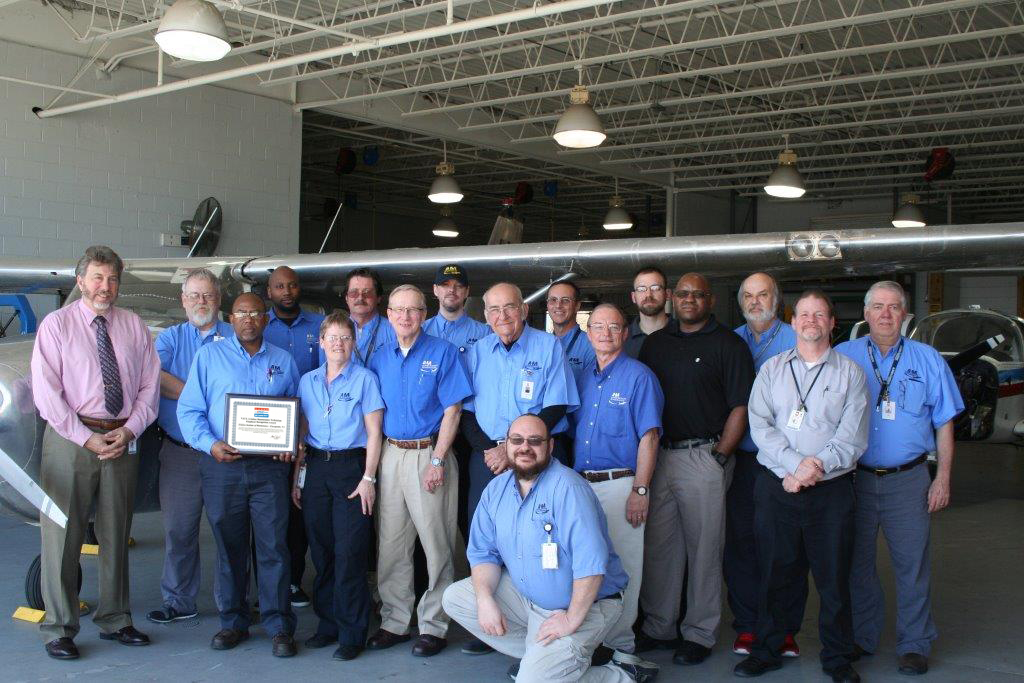 Back row left to right: Ric Ryburn, Dominic Cummings, Thomas Stevens, Tim Murray, Ken Panissidi, Tim Carter, and Dan Burke. Front row left to right: Brad Groom, Jeremiah Lee, Nancy Jones, Jerry Snyder, Ed Capone, Ken Wiley, Carl Craig, Thomas Schaffer, Kurt Gibson and very front David Karnuth.