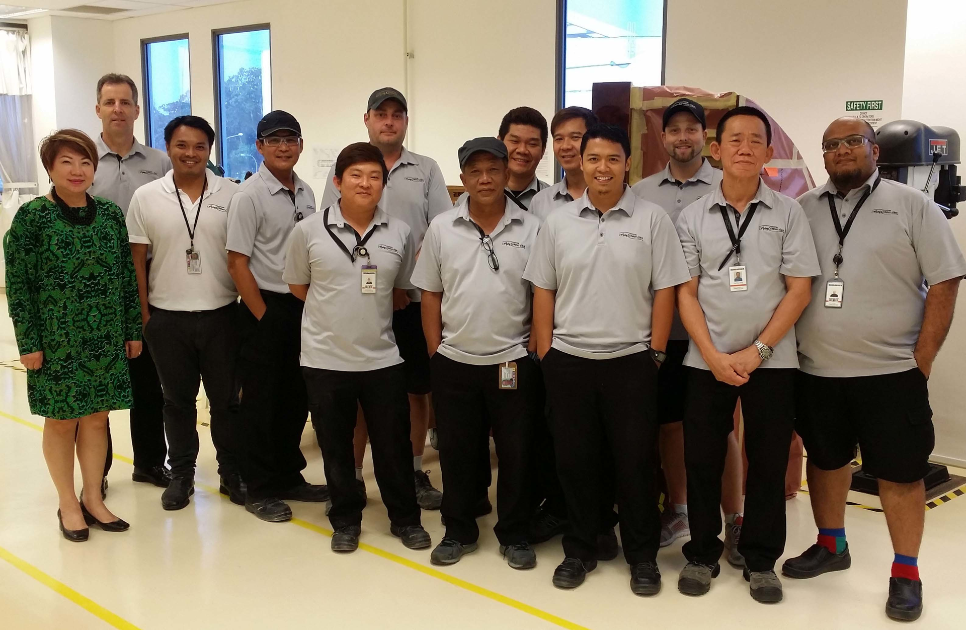 The Flying Colours Corp. team at the Singapore Seletar Airport facility.