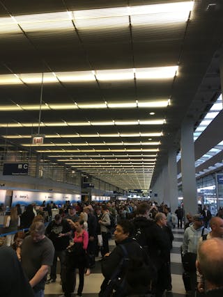 A security line on May 15, inside Terminal 3 at Chicago O&apos;Hare International Airport (ORD) warps around the walkway to accommodate the crush of passengers.