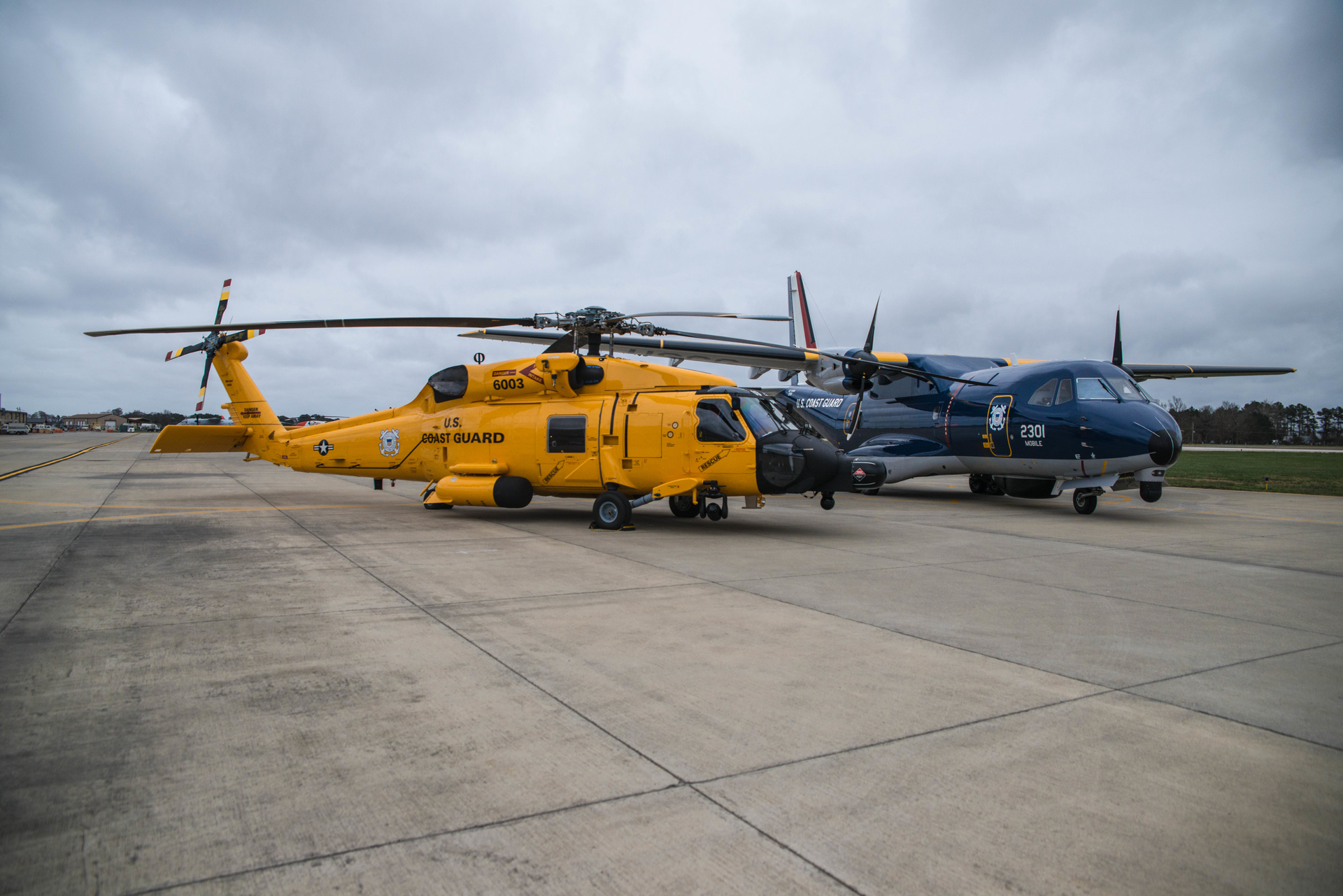 Six MH-60 JAYHAWK&trade; helicopters have been repainted in 1950s-era yellow, and a dark blue and silver metallic livery flown from 1934 to 1943 has been recreated on two HC-144 Ocean Sentry aircraft.
