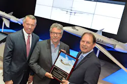 From left: Brad Thress, senior vice president, Customer Service, Textron Aviation; Lutz Druemmer, director of Maintenance Aircraft, Simulator & Facilities Postholder Maintenance; and Scott Ernest, President & CEO, Textron Aviation.