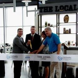 Cutting the ribbon, from left to right, Stephen Douglas, vice president of business development, HMSHost; Jeff Roach, airport manager, Fairbanks International Airport; Theresa Harvey, chief of leasing, Fairbanks International Airport; and Dennis L. Michel, American Mechanical Inc. Cutting the ribbon, from left to right, Stephen Douglas, vice president of business development, HMSHost; Jeff Roach, airport manager, Fairbanks International Airport; Theresa Harvey, chief of leasing, Fairbanks International Airport; and Dennis L. Michel, American Mechanical Inc.