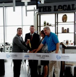 Cutting the ribbon, from left to right, Stephen Douglas, vice president of business development, HMSHost; Jeff Roach, airport manager, Fairbanks International Airport; Theresa Harvey, chief of leasing, Fairbanks International Airport; and Dennis L. Michel, American Mechanical Inc.