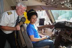 Wish kid Chidinma, with United Captain Curt Hinkle, gets ready for takeoff to Rome on United’s 10,000th donated ticket to Make-A-Wish. Wish kid Chidinma, with United Captain Curt Hinkle, gets ready for takeoff to Rome on United’s 10,000th donated ticket to Make-A-Wish.