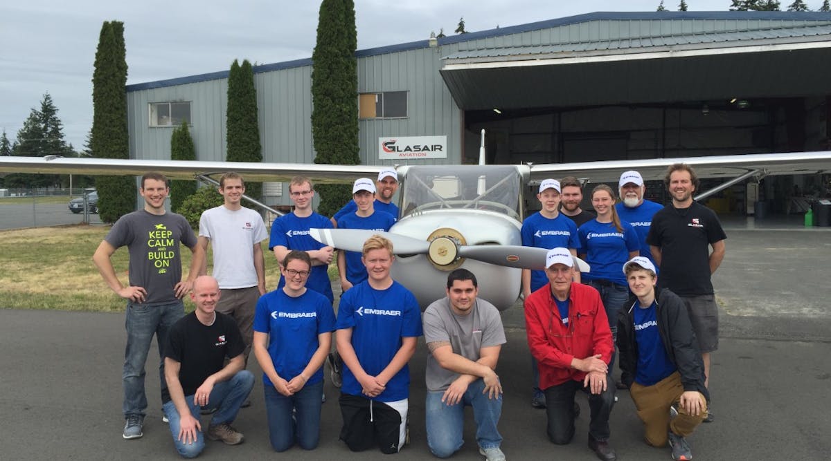 The students from Weyauwega, WI, showing off their aircraft after a week building it at Glasair Aviation in Arlington, WA. Next stop EAA AirVenture.
