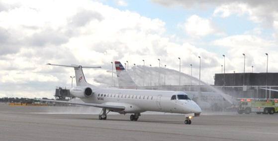 The first flight of Great Lakes Jet Express lands at O'Hare.