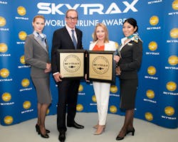 Air Astana at the Skytrax World Airline Awards Ceremony at the Farnborough International Airshow July 12. From left to right, Oxana Khlebopashnikova, ground services supervisor; Peter Foster, president &amp; CEO; Yelena Obukhova, deputy director, inflight services; Zhadyra Utemuratova, inflight supervisor.