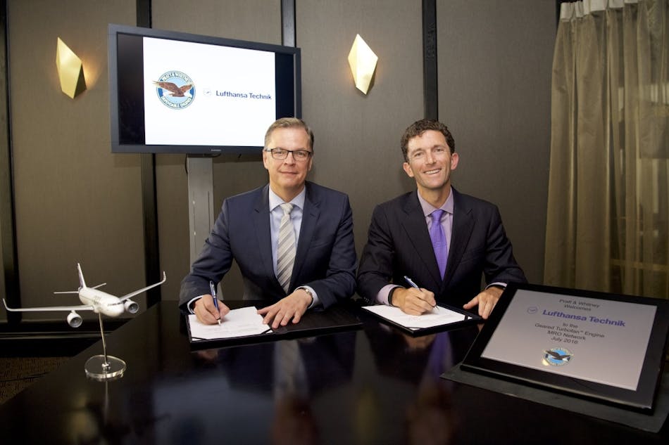 Dr. Johannes Bussmann (chairman of the Executive Board of Lufthansa Technik) and Matthew Bromberg (president Pratt &amp; Whitney Aftermarket) during the signing ceremony