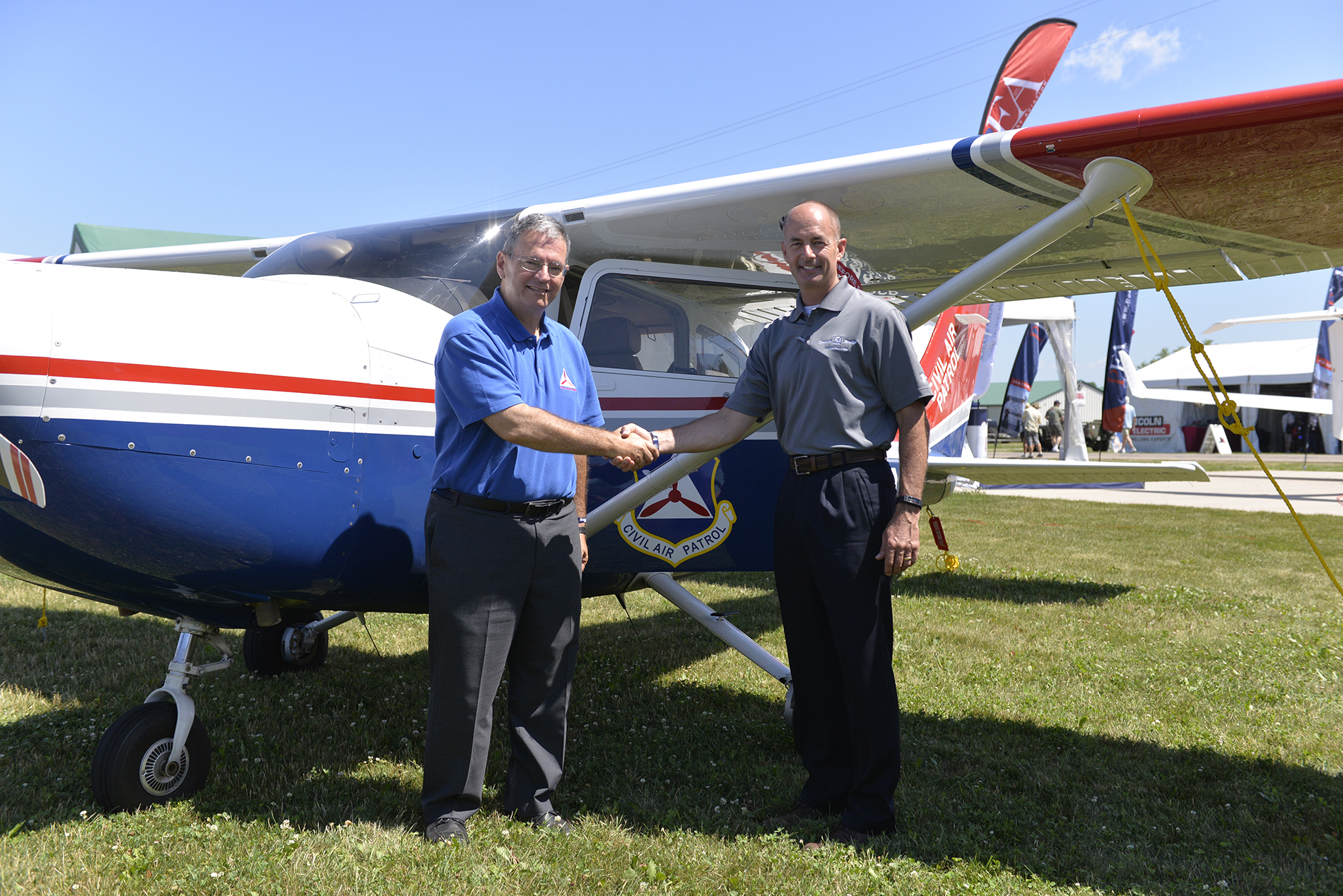 Left to right: Major General Joseph Vazquez, Civil Air Patrol and Doug May, vice president of Piston Aircraft
