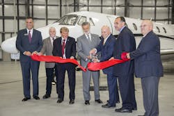 Ribbon cutting at the new Signature Flight Support facility at Burke Lakefront Airport. Ribbon cutting at the new Signature Flight Support facility at Burke Lakefront Airport.