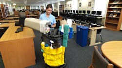 Hooks on the outside of a cart allows janitorial products to come along for easier and more efficient cleaning.