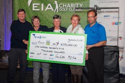 Tom Ruth, EIA President and CEO, Left, and Myron Keehn, EIA VP Commercial Development, right, present the Cheque to Deb Cautley (YESS), Erna Carter (Riseup Society Alberta) and Gert Reynar (LDFB).