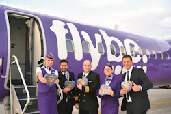 To celebrate the inaugural flight to Southampton, the Flybe crew were presented with traditional gingerbread hearts by Munich Airport's airline liaison manager Martin Laubenthal (right).
