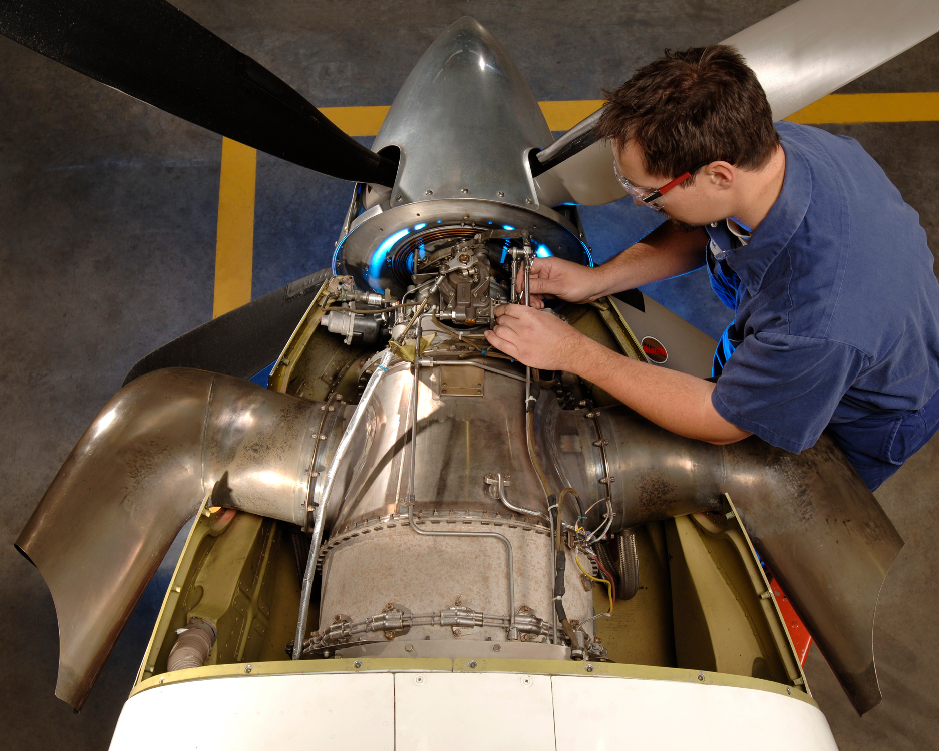 Technician working on a PT6.