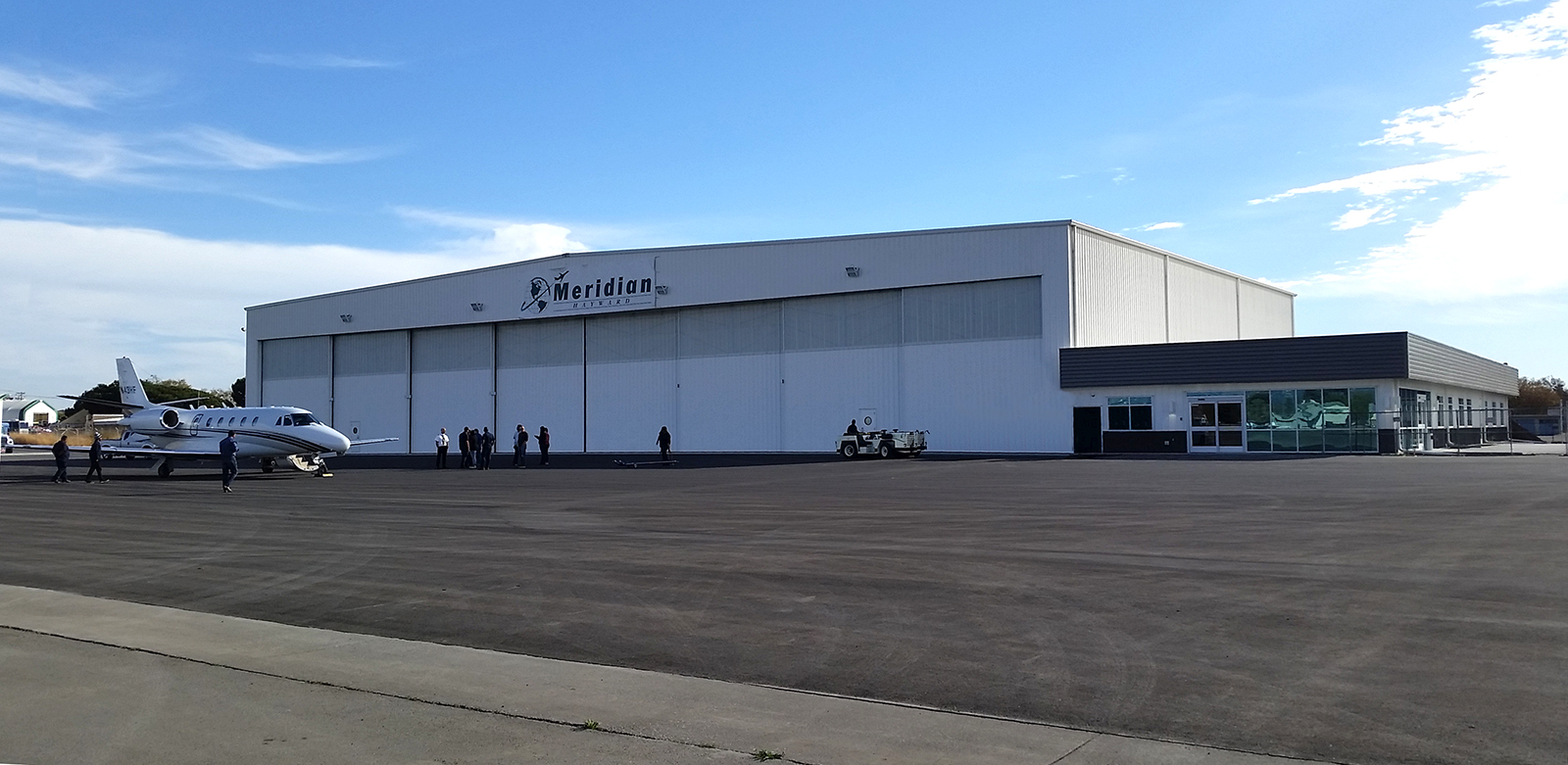 The facility features professionally-trained customer service and line service teams, an elegant main lobby, business center, conference room, pilot briefing area, pilot lounge, coffee bar, kitchen/catering area, sleep room, shower and locker room, rental cars, and crew cars.