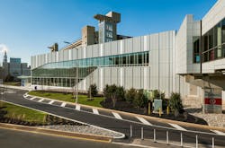 The new building is now located across from the main Terminal F building and can be accessed by an indoor 400-foot pedestrian bridge. The new building is now located across from the main Terminal F building and can be accessed by an indoor 400-foot pedestrian bridge.