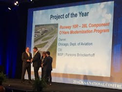 Thomas Lyon, Phil Farsalas and Marge Lauer, all of WSP | Parsons Brinckerhoff, accepted the award on Oct. 11.